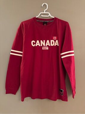 UNISEX Canada Long-Sleeve Red Crewneck Tee with embroidered logo and flag
